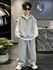 Conjunto de sudadera para niño 2026 nuevo primavera y otoño ropa deportiva grande para niños chaleco con capucha conjunto de tres piezas para niños moda casual