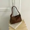 Bolsos de mano para mujer transfronterizos 2026 nueva moda bolso de hombro moderno retro bolso albóndiga bolso de hombro simple bolso tote