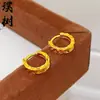 Item quente do TikTok: Brincos de cobre banhados a ouro com cristais de gelo cintilantes e padrões intrincados, novos brincos de luxo leve estilo chinês para mulheres