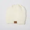 Gorro de punto para coleta de otoño e invierno al por mayor gorro de lana cálido con terciopelo venta directa gorro de luna simple para mujer gorro de cúpula