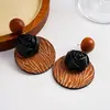 Pendientes de borla con carcasa de madera marrón transfronterizos europeos y americanos, pendientes de estilo vintage Maillard, pendientes de mujer de lujo ligero de alta gama
