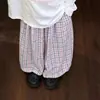 Conjunto de Roupas com Proteção Solar Infantil Outono Novo Estilo Versátil para Meninas Camisa Estampada de Gola Redonda Solta Cardigã Casual Calça Xadrez Tendência