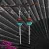 Pendientes Retro Palaciegos Chinos con Borla y Cuentas Planas Redondas Agrietadas para Mujer Lujo Ligero Temperamento de Gama Alta Estables y Grandiosos No Monótonos