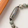 Pulsera de cuentas largas de barril Dzi de Nueve Ojos Verdes para Mujer, Estilo de Alta Gama, Cuentas de Oración Budistas, Artículo Popular para Venta al por Mayor