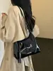 Bolso de mano para mujer 2026 nuevo simple color liso nicho retro versátil diario para ir al trabajo tote bandolera