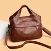 Bolso de Mujer Estilo Retro 2026 Nuevo Bolso de Mano de Moda Versátil Nicho Bolso Cruzado para Viajes al Trabajo Bolso para Madre Suegra