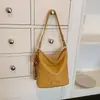 Bolsa de ombro retrô transfronteiriça, nova bolsa de balde grande capacidade outono 2026 para mulheres, bolsa de ombro e transversal