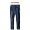 Pantalones Rush Delgados para Hombre para Primavera y Otoño para Parejas al Aire Libre Deportes Montañismo Cortavientos Transpirables Pantalones de Montañismo Mujer Venta al por Mayor de Fábrica