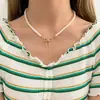 Collar de perlas de doble capa estilo retro francés para mujer, ligero, lujoso, de alta gama, con cadena para el cuello.