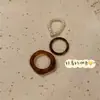 Anillo Retro de Otoño e Invierno Apilado de Tres Piezas con Índice de Resina de Perla Ámbar Diseño de Nicho para Mujer Lujo Accesible Anillo de Cola de Gama Alta