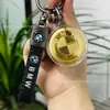 Pingente de chaveiro com logo de carro em ouro 999 puro, acessório para carro, presente para pai ou namorado, adequado para concessionárias e lojas 4S, atacado para atração de clientes