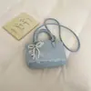 Nova moda feminina 2026 luxo leve elegante estilo coreano para o dia a dia bolsa de ombro única cor sólida bolsa tiracolo