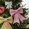 Nuevo colgante de lazo de plástico con purpurina de Navidad para crear una atmósfera festiva, adecuado para escaparates de casas y decoraciones de árboles de Navidad