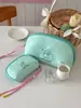 Bolsa de cosméticos para cachorros felices transfronteriza estilo simple Macaron ins gran capacidad bolsa de almacenamiento para empaque de ropa interior