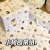 Una variedad de lindos papeles de regalo de dibujos animados para regalos navideños, materiales de embalaje para cajas de regalo, papel de regalo mixto de alta apariencia