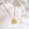 Collar con colgante de 26 letras inglesas chapado en oro y cobre de Aogu, venta transfronteriza, cadena de clavícula personalizada con nicho INS para mujer