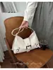 Bolso de mujer 2026 nuevo verano súper popular nicho para ir al trabajo al hombro bajo el brazo gran capacidad tote de viaje cruzado