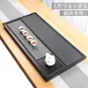 Bandeja de té de piedra Wujin piedra natural completa piedra grande Piedra Oro Negro Mar de té mesa de té simple para el hogar letras del logotipo