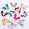 Ventas Directas de Fábrica Personalizado Creativo Mariposa Doble Colgante DIY Joyería Accesorios Materiales Aceite Goteando Aleación Color Mixto Lote Mixto Venta al por Mayor