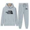 Sudadera con capucha de forro polar para hombre de otoño e invierno Conjunto de sudadera para hombre Traje deportivo casual estampado Fabricante Venta al por mayor