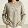 Nuevo jersey transfronterizo estilo europeo y americano 2026, sudadera simple y casual con lazo, cuello redondo, corte holgado, suéter de manga larga para mujer, adecuado para otoño e invierno