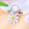 Chaveiro de Metal com Flor Margarida Abelha Venda Quente Transfronteiriça Pingente Decorativo para Bolsa de Menina Presente para Estudante