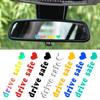 Pegatinas reflectantes para espejo retrovisor que indican precaución al conducir en el extranjero.