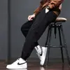 Pantalones casuales con forro polar transfronterizos para hombre, marca de moda, versátiles, con buena caída, pantalones de hombre con puño, pantalones tipo harén de moda para otoño e invierno