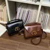Bolso Pequeño Cuadrado Retro para Mujer 2026 Nuevo Estilo Bolso de Hombro Rígido de Cuero Hebilla de Metal con Cierre Bolso Cruzado para Commuter