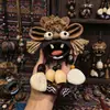 Campana de Agua Natural Cáscara de Fruto de Alcanfor Colgante de Dibujos Animados Carrillón de Viento Terminado Bolsa de Semillas Curativas Decoración Popular en Zonas Turísticas Llavero Lindo