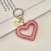 Llavero Creativo de Arcilla Cerámica Corazón Hueco Full Diamante Colgante Simple para Bolso de Mujer Corazón de Melocotón Incrustado con Pedrería Colgante para Llave de Coche