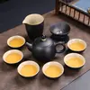 Juego de té de cerámica negra estilo japonés traje de té tetera vintage con asa lateral oferta especial regalo caja de regalo exquisita juego de cerámica Dehua