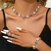 Collar con pendientes de perlas exageradas de estilo europeo y americano, elegante cadena de clavícula de dos piezas, joyería ligera de lujo de alta gama para mujer.