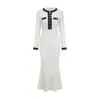 Otoño e Invierno Europeo y Americano Estilo Nuevo Estilo Chanel Vestido de Punto de Punto de Longitud Media Manga Larga Costuras de Mezclilla Base Vestido Suéter de Corte A