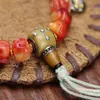 Fabricante de Hueso de Yak al por Mayor Material de Sangre Hueso de Vaca Pulsera Tallada de Mano un Dai Tíbet Accesorios de Borla de Tres Vías