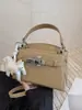 Bolsa de Mão Nova Moda 2025 Transfronteiriça Feminina Ombro Transversal Design de Nicho de Alto Padrão Bolsa Kelly para o Dia a Dia