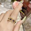 Camélia estilo europeu graça design oco verde pontiagudo anel de cristal banhado a ouro diamante embutido elegante colorido tesouro anel aberto