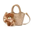 Bolso de lunares estilo coreano para niñas, con un lindo dije de oso, una mini bolsa cruzada para bebé y un lazo de perlas - una bolsa accesorio para niños