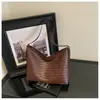 2026 Nuevo Bolso de Mano Bolso de Hombro Moda Simple Casual Textura Retro Estilo Coreano Bolso Tejido de Hombro Único