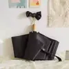 Paraguas plegable de ocho varillas con 70% de descuento personalizado con recubrimiento negro UV, protección solar y contra la lluvia, paraguas automático, se puede imprimir con logo, paraguas publicitario