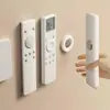Soporte de pared con succión magnética para control remoto, no requiere perforación, tira magnética fuerte, soporte para regleta, gancho entrelazado