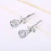 Hebilla de oreja de circonita de venta caliente transfronteriza pendientes largos de lazo para mujer pendientes simples de moda pendientes colgantes fabricantes