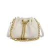 Bolsa de corrente com padrão de losangos da moda para mulheres, nova versão coreana da moda 2026, pequena bolsa tipo balde estilo Chanel, bolsa versátil de ombro e transversal