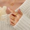 Anillo de trémolo de estilo francés con nicho de apertura hueca geométrica de 8 caracteres que no se desvanece, anillo de cola para hombres y mujeres A313