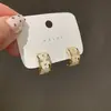 Pendientes de aro con diseño de nicho de alta calidad para mujer, nuevos pendientes huecos de moda 2023, pendientes que combinan con todo.