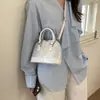 Bolsa Pequena Criativa para Mulheres 2026 Novo Estilo Bolsa de Ombro Bolsa de Mão Fashionable Bolsa Concha Retrô Bolsa Transversal Simples Casual