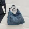 Bolso grande de mezclilla para mujer, nuevo diseño de moda 2026, bolso de hombro cruzado retro simple, bolso tote casual para el día a día