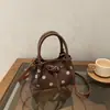 Bolso de hombro cruzado de nailon con lunares para comercio exterior estilo coreano 2026, nuevo, elegante, retro, de un solo hombro