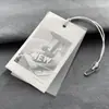 Etiqueta de ropa tarjeta pegamento flexible transparente papel especial listado LOGO ropa de mujer etiqueta personalizada diseño gratuito