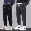 Pantalones deportivos para hombre 2025 nuevo estilo primavera y otoño, pantalones jogger holgados para otoño e invierno, pantalones de chándal de pana para adolescentes